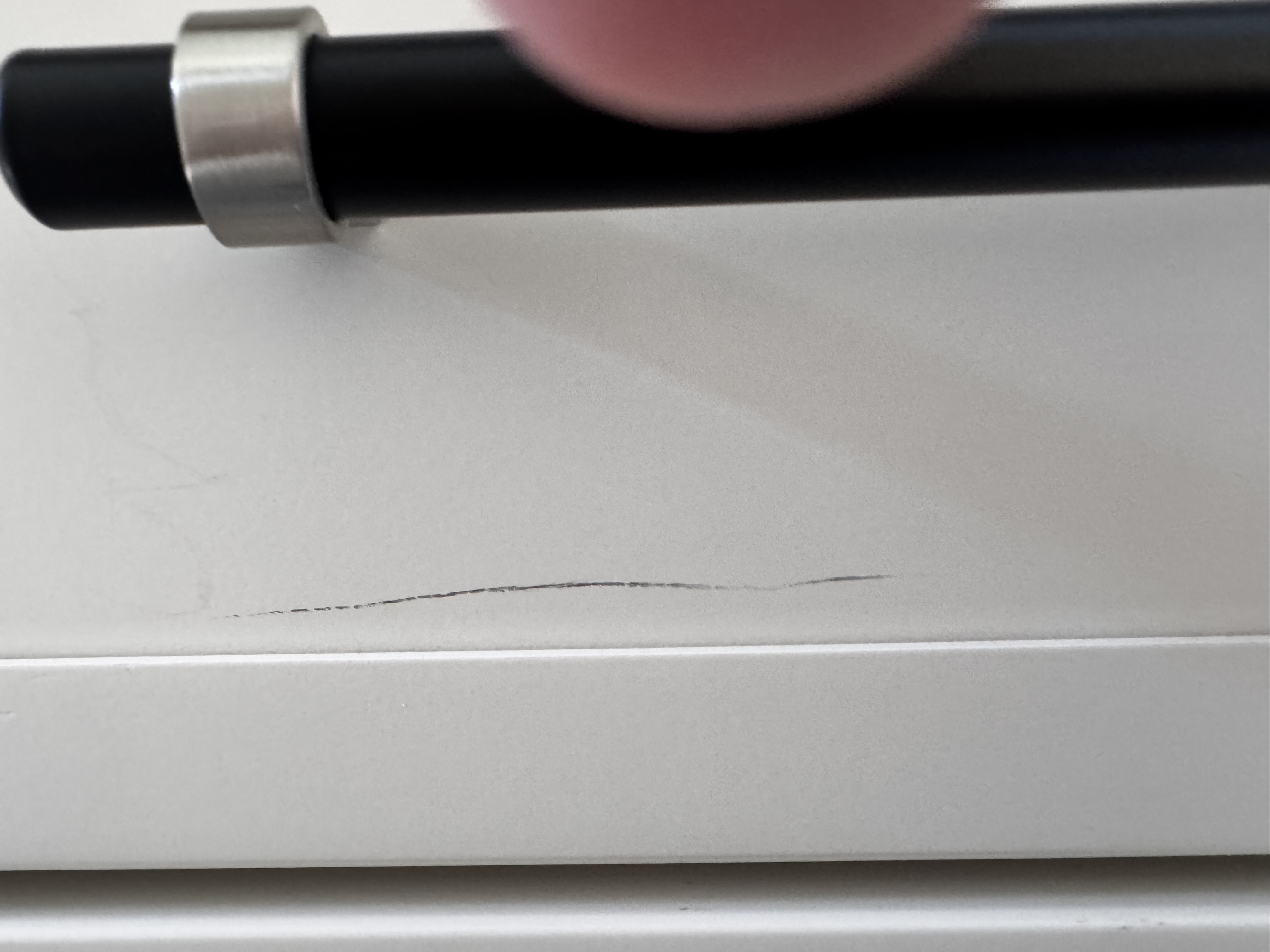 Scratch on a bathroom vanity cabinet